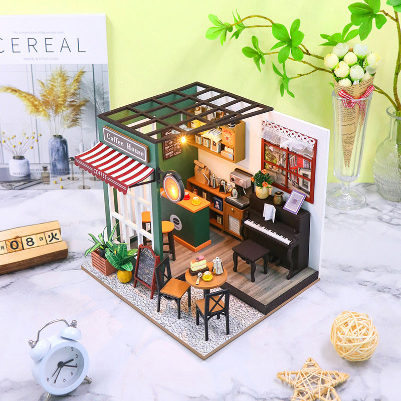 Lucky Cafe House DIY Dollhouse Kit model featuring a charming coffee shop interior and miniature furniture.